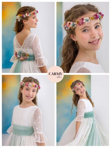 Niña con corona de flores, vestida con un vestido blanco y verde, sonriendo. Fondo colorido.